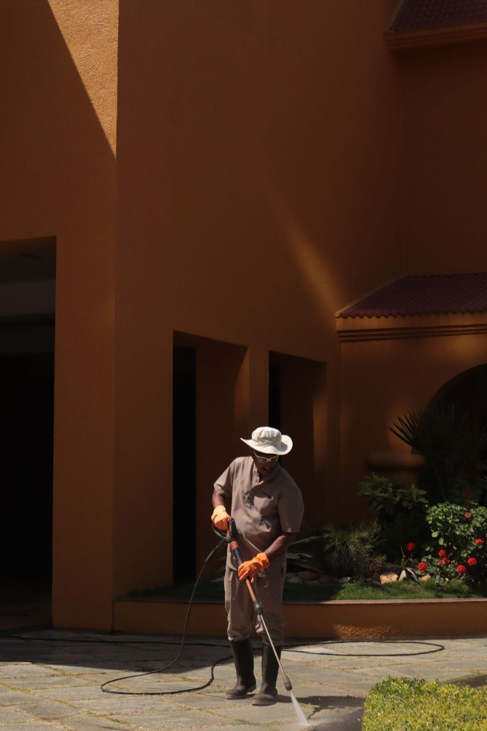 Cleaning the walkway outside a commercial property